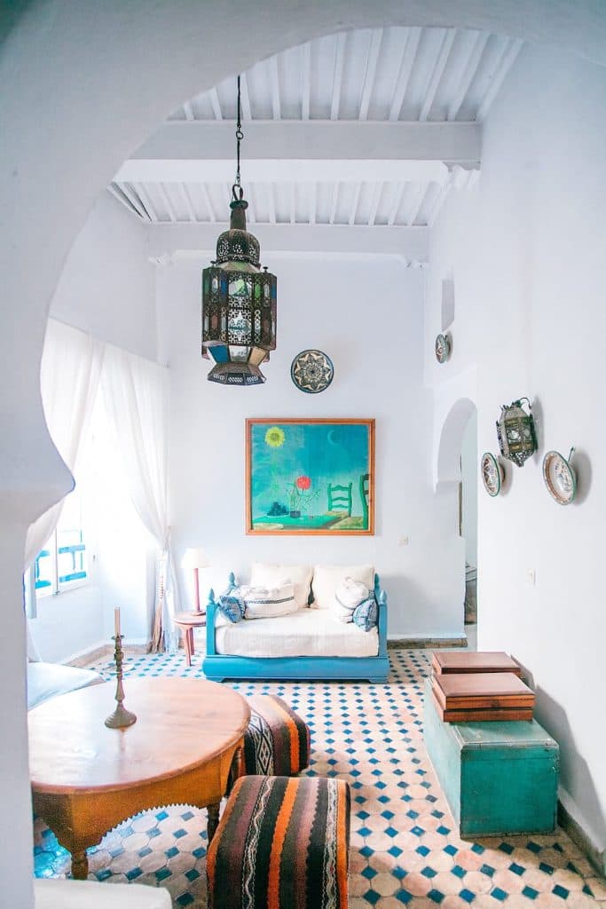 Deluxe room with a wooden canopy bed
